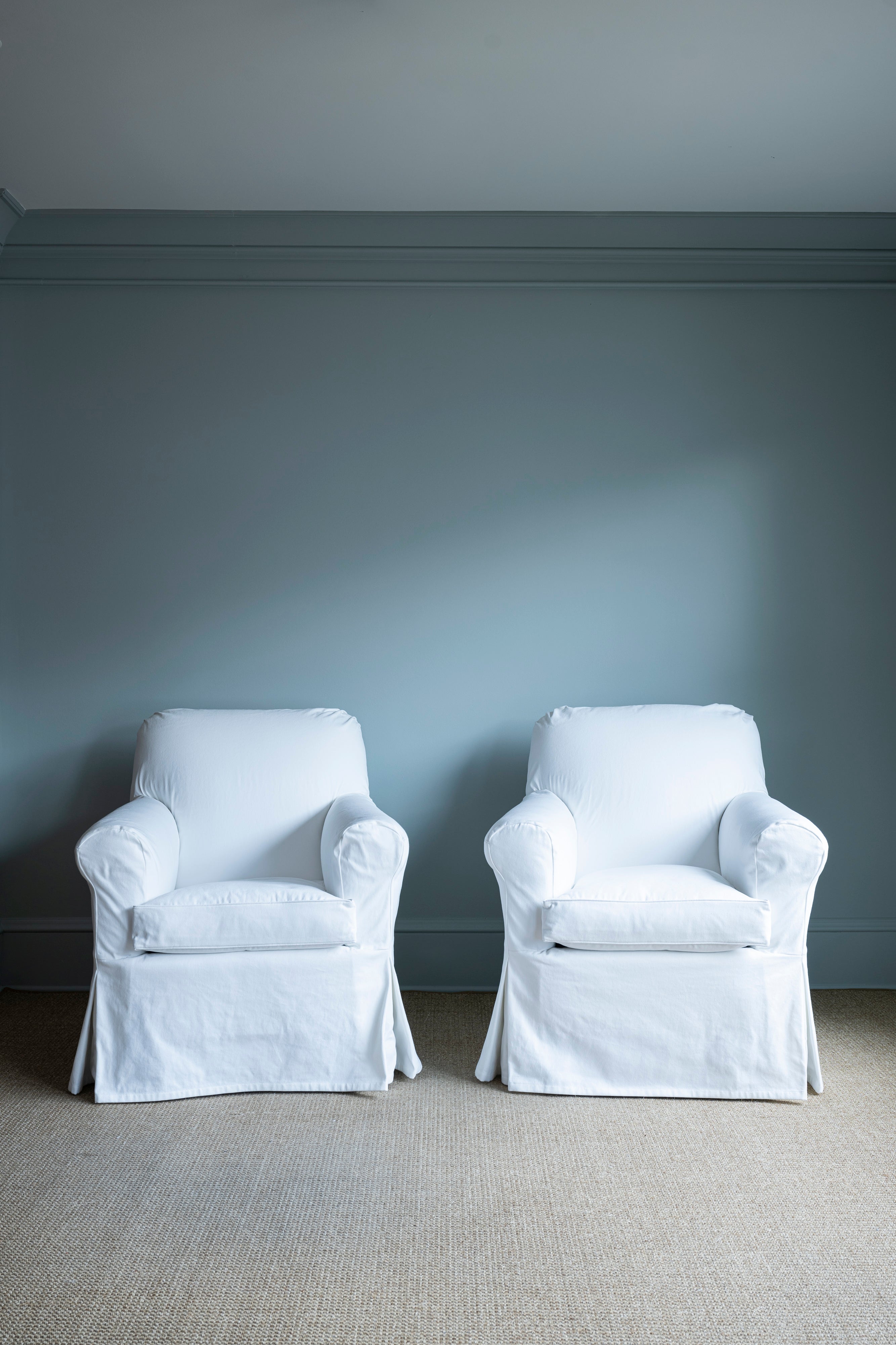 Pair of White Slipcovered Chairs