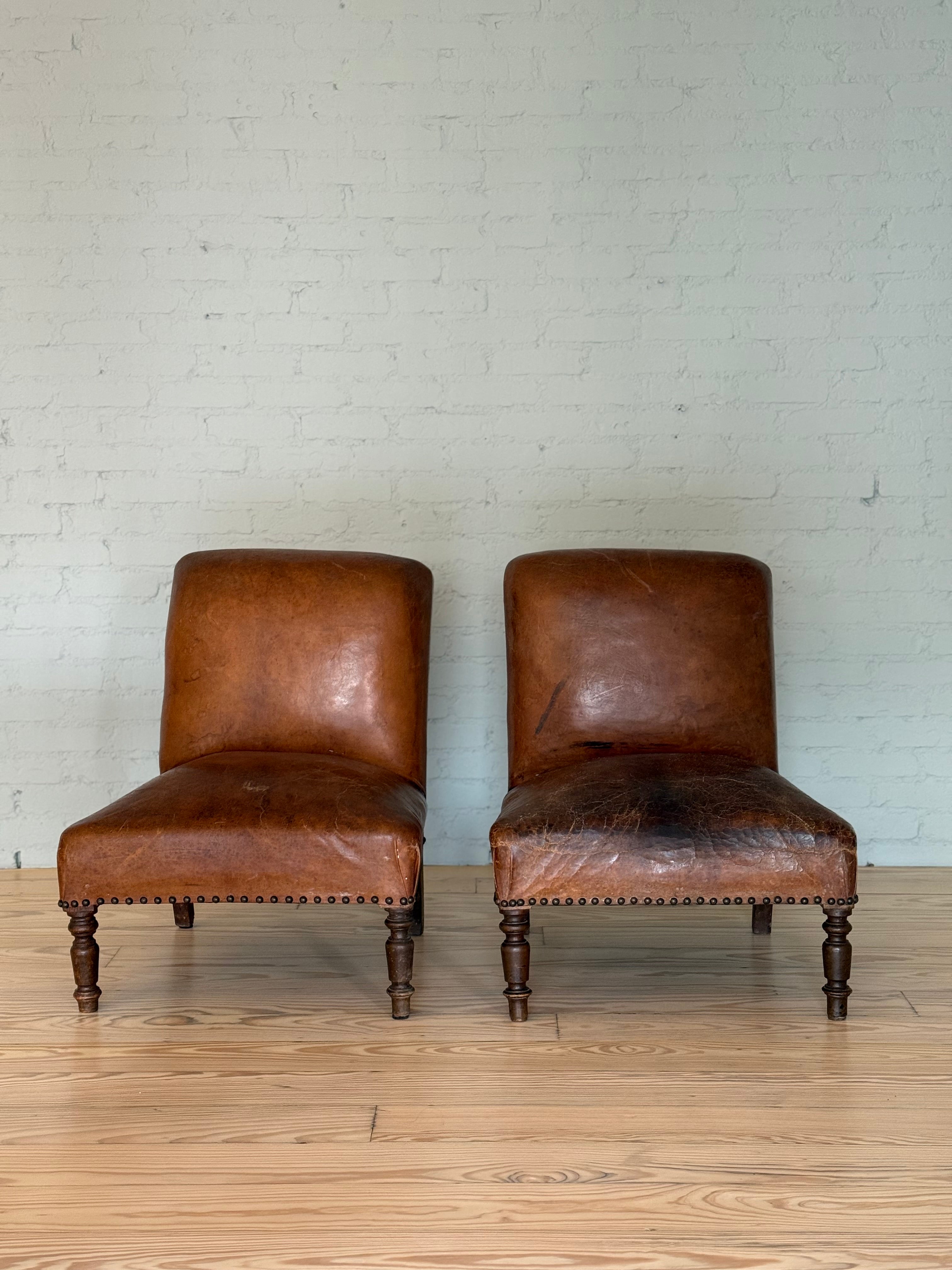 Pair of Antique Leather Slipper Chairs