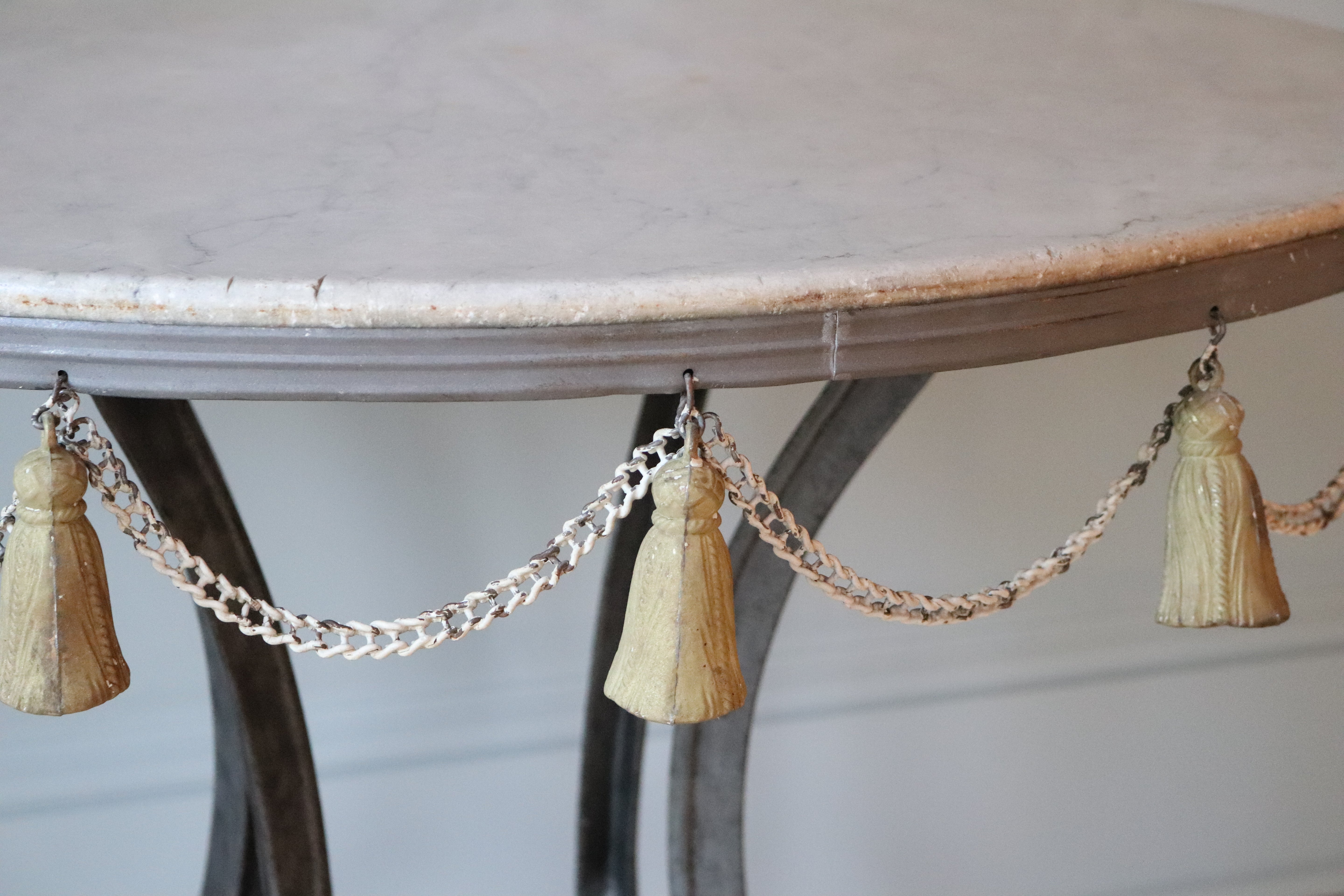 Round Garden Table with Marble Top & Tassel Accent