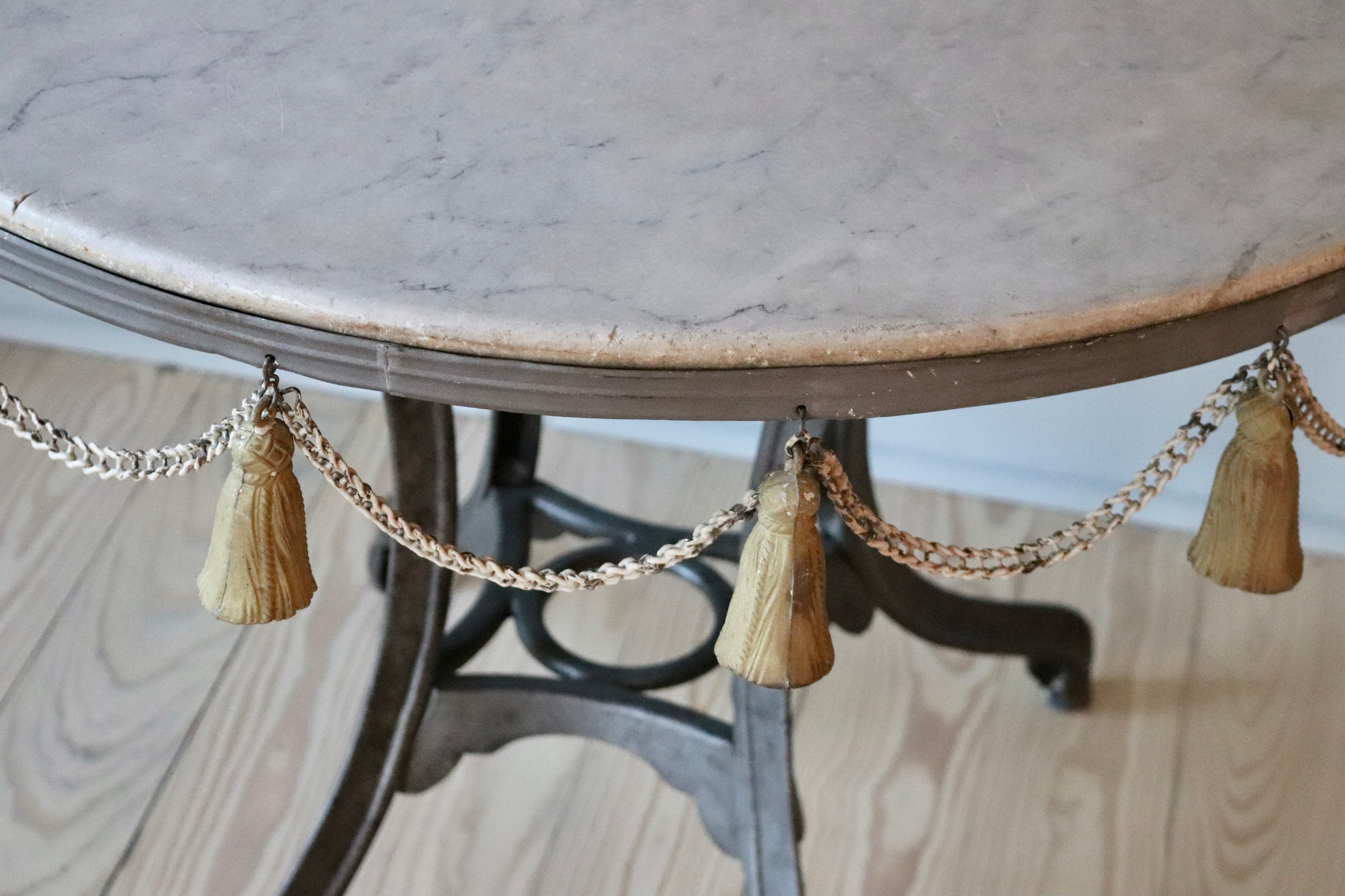 Round Garden Table with Marble Top & Tassel Accent