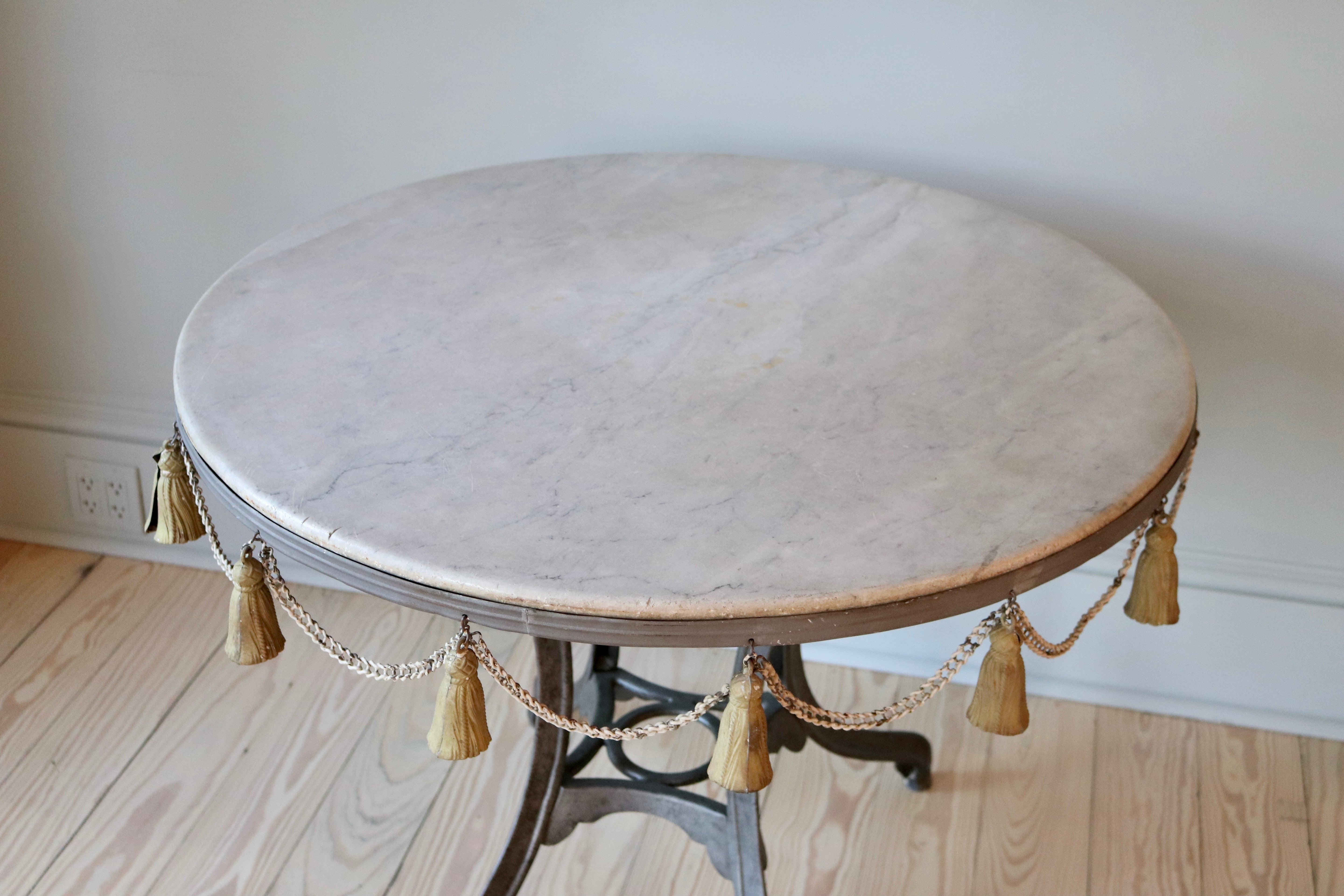 Round Garden Table with Marble Top & Tassel Accent