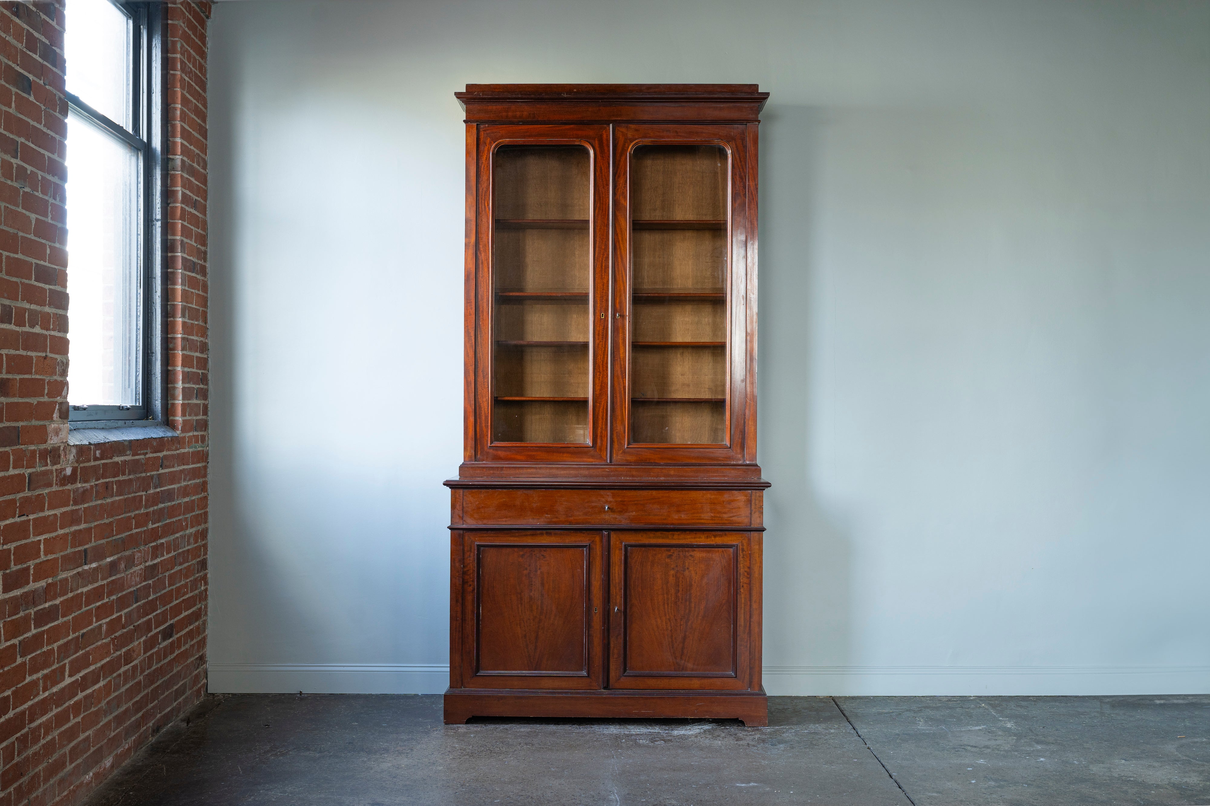 Tall English Glass Front Cabinet