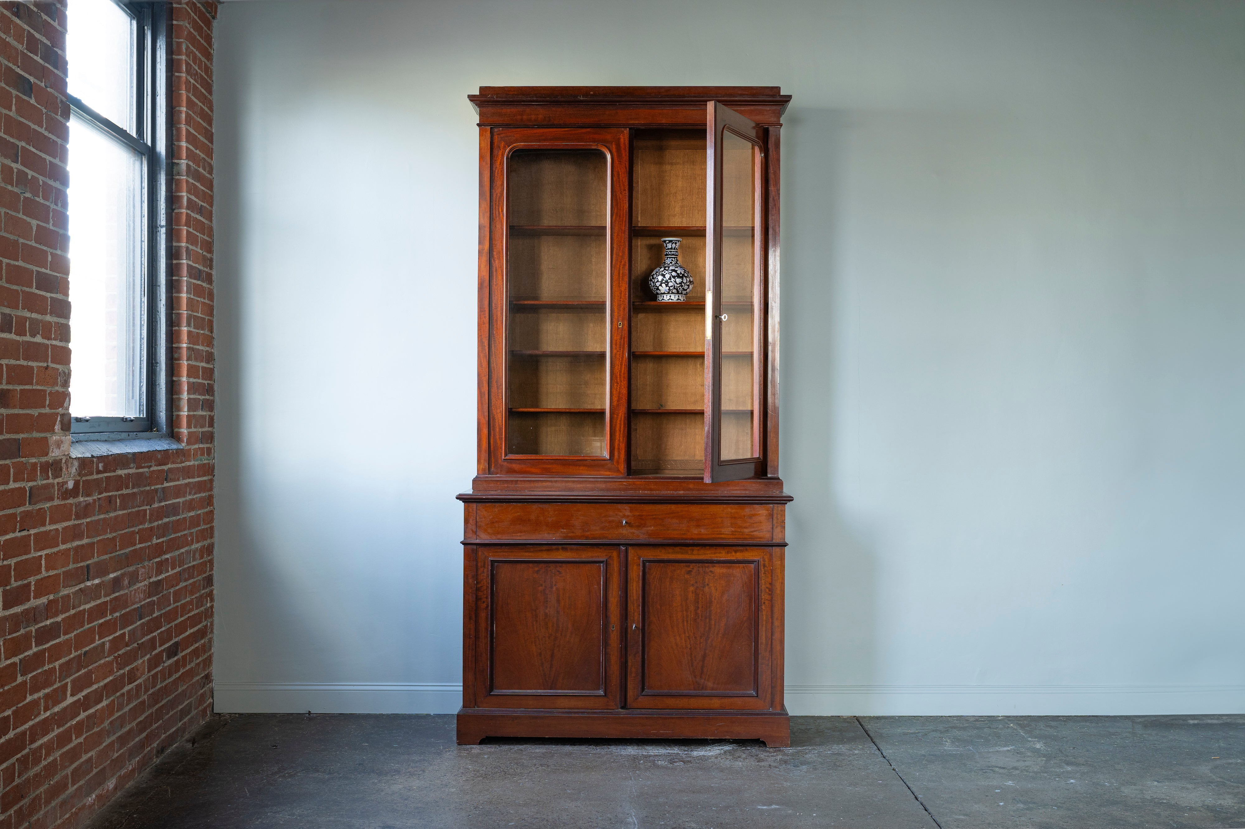 Tall English Glass Front Cabinet