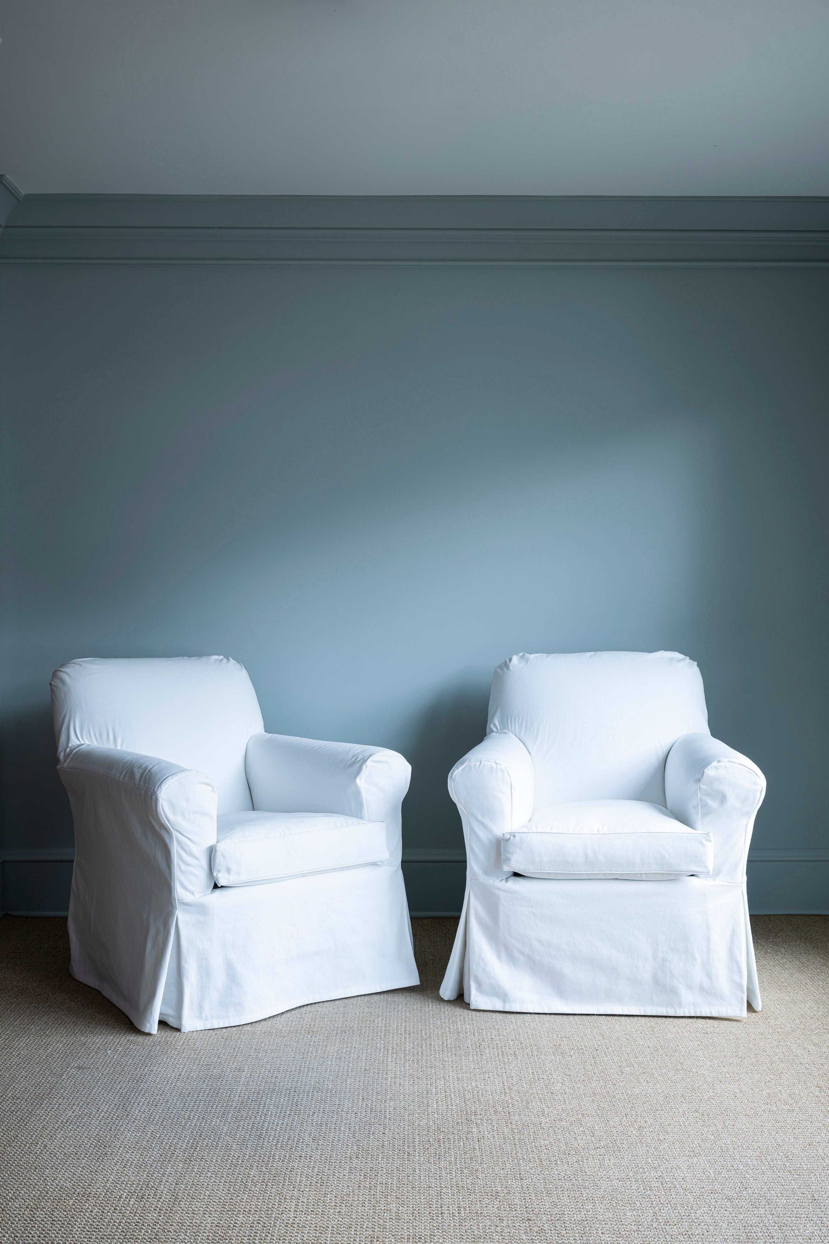 Pair of White Slipcovered Chairs